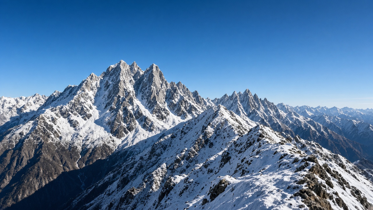 Snow-covered high-altitude mountain peaks